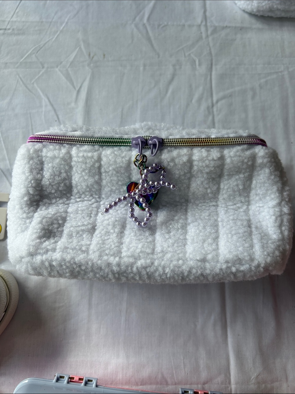 White Quilted Sherpa Cosmetic Pouch with Rainbow Zipper